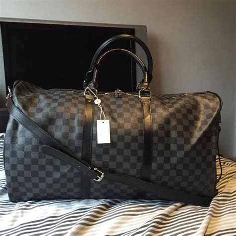 louis vuitton mens leather travel bag|louis vuitton weekend bag men's.